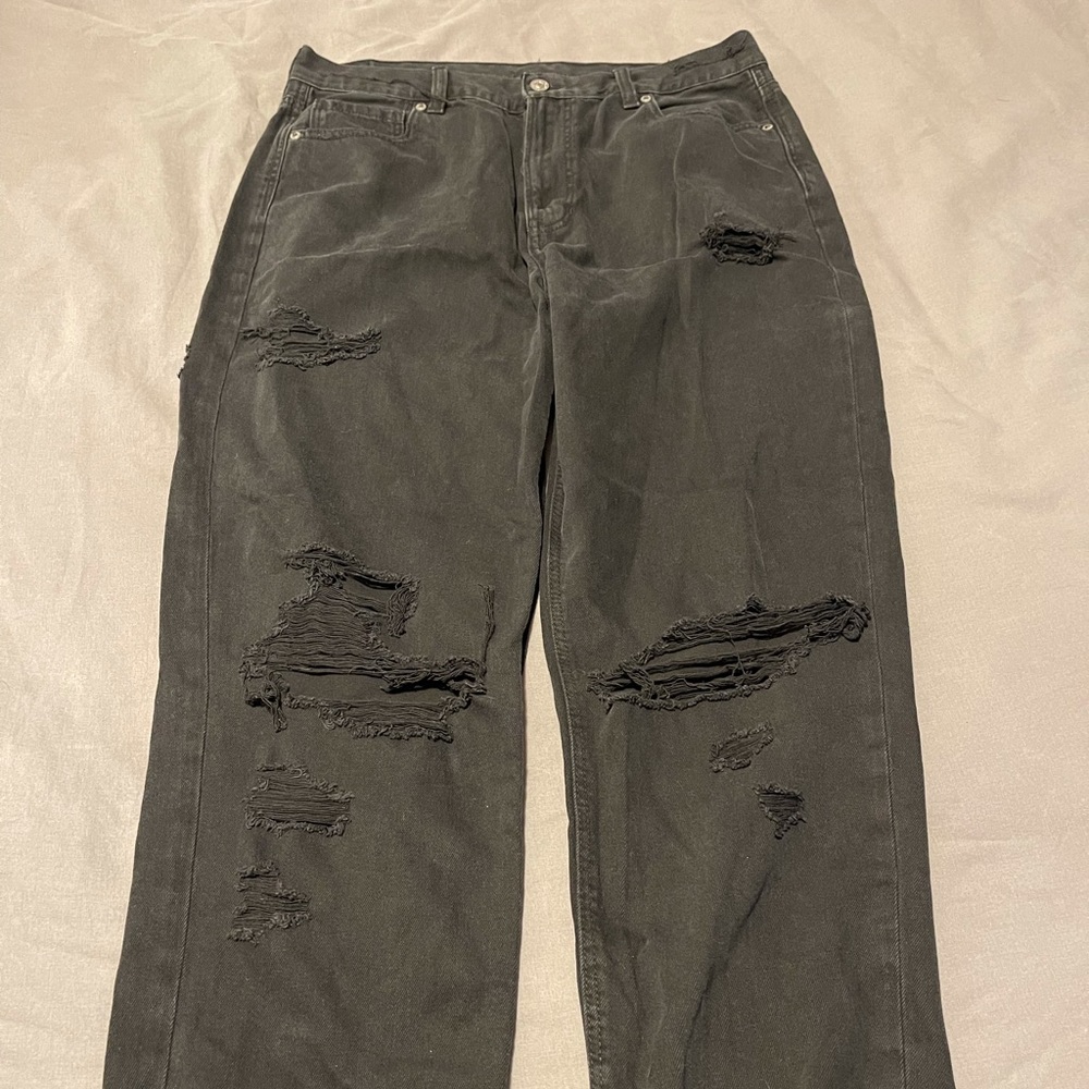 American Eagle Jeans, distressed in front and back.
